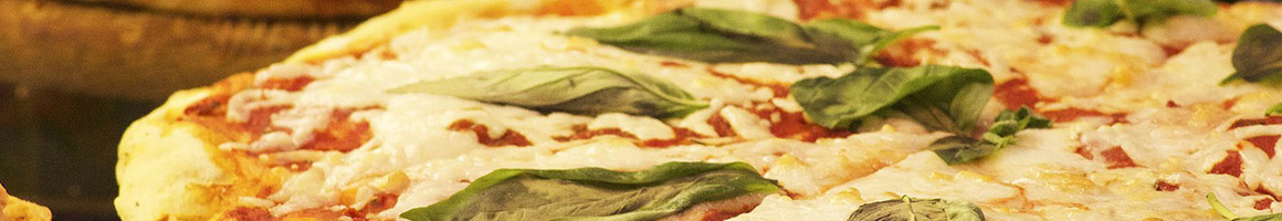 Eating Italian Pizza at Mama Cimino's Pizza restaurant in Lake Geneva, WI.